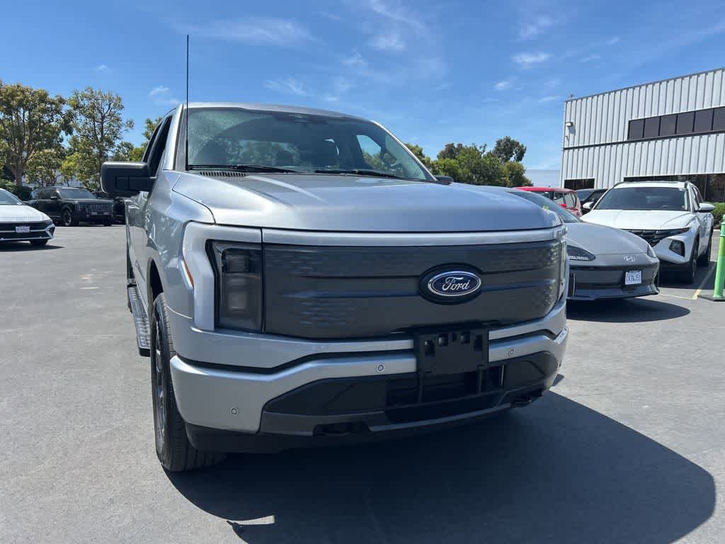 Used 2023 Ford F150 Lightning XLT w/ Equipment Group 312A High AWD/4WD image 1