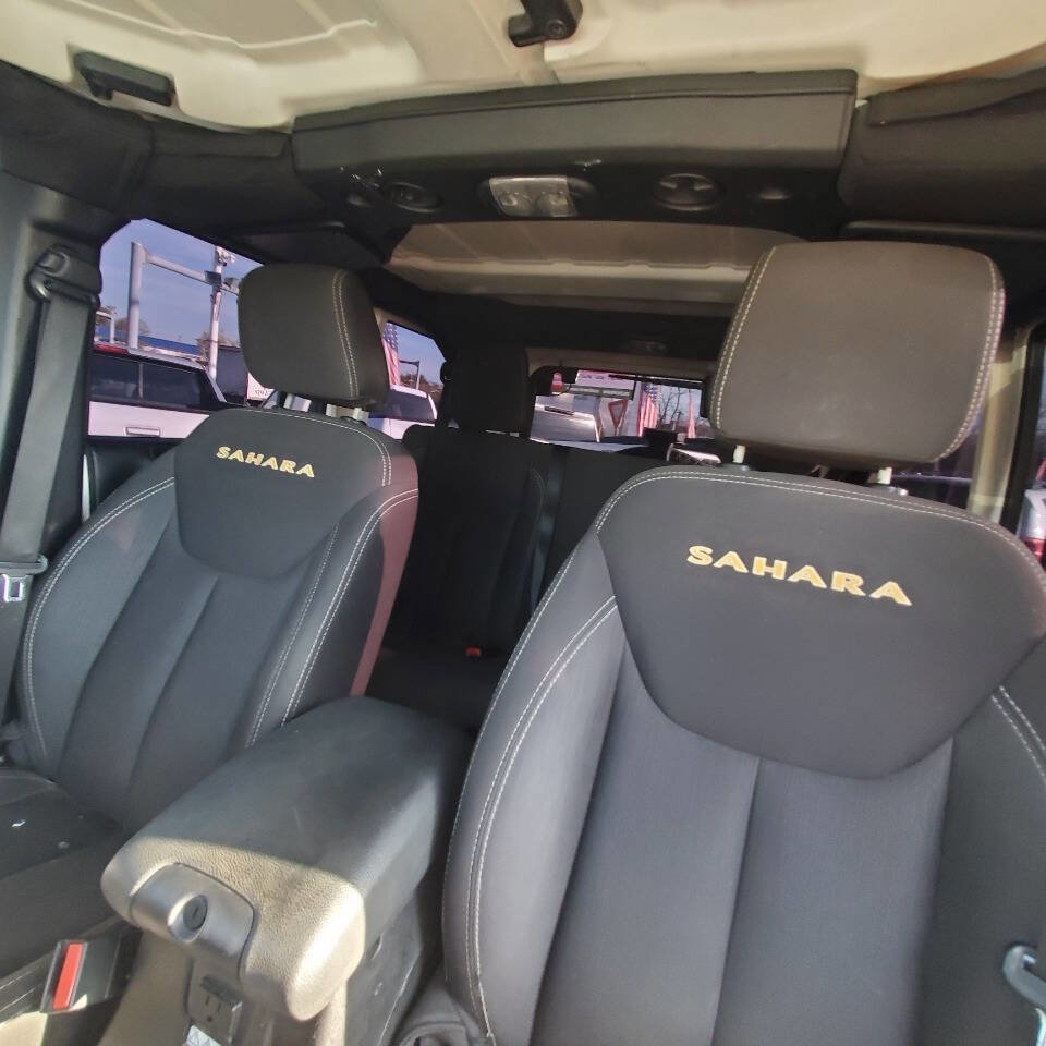 Used 2015 Jeep Wrangler Unlimited Sahara w/ Dual Top Group AWD/4WD image 22