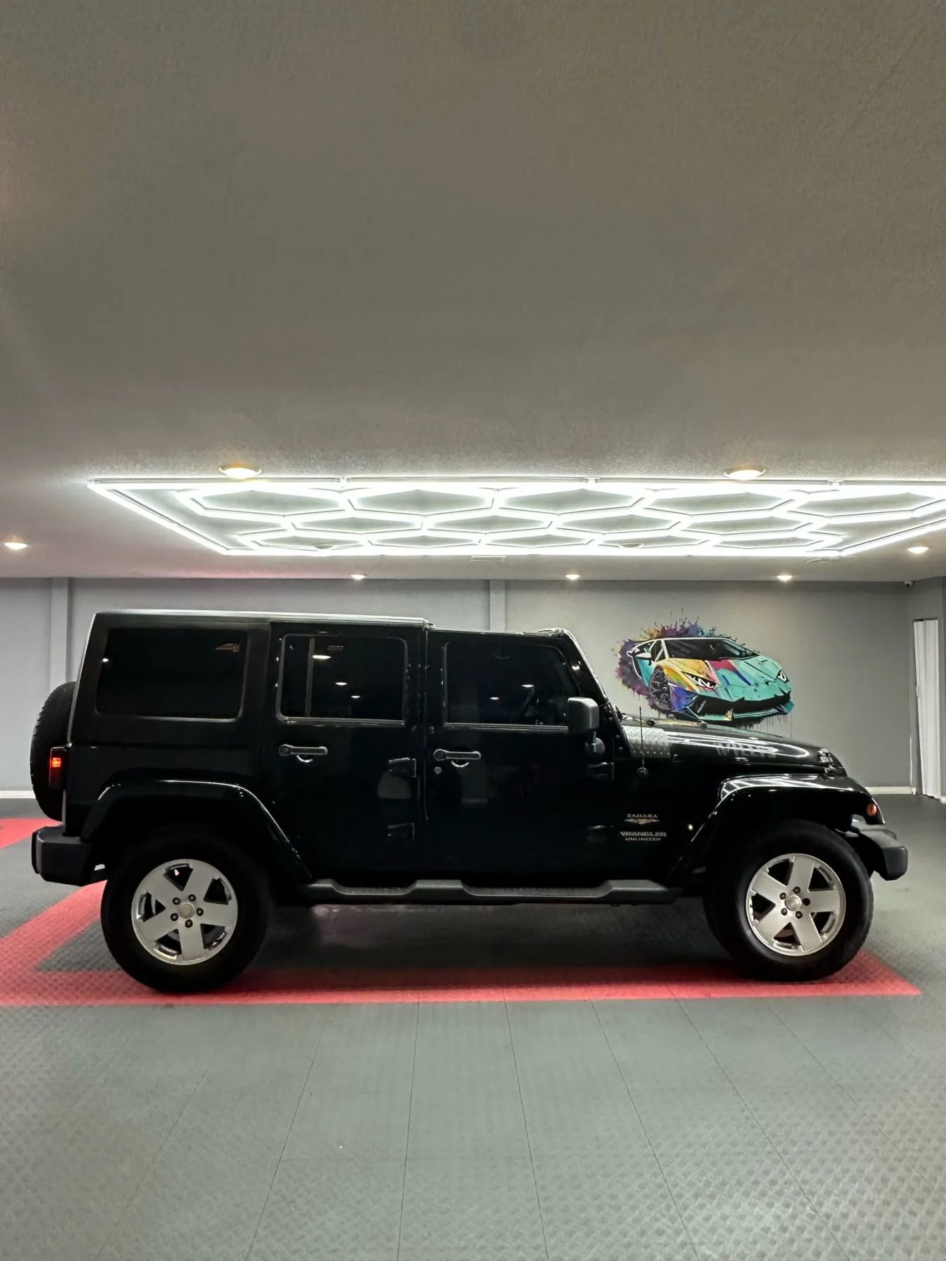 Used 2012 Jeep Wrangler Unlimited Sahara w/ Dual Top Group AWD/4WD image 8