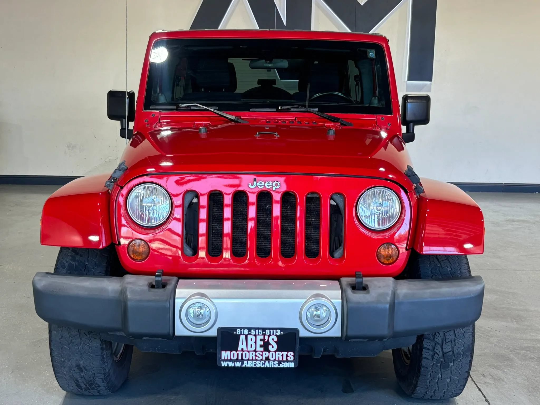Used 2011 Jeep Wrangler Unlimited Sahara w/ Dual Top Group AWD/4WD image 2