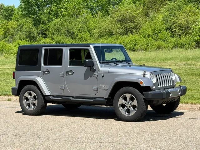 Used 2016 Jeep Wrangler Unlimited Sahara w/ Dual Top Group AWD/4WD image 1