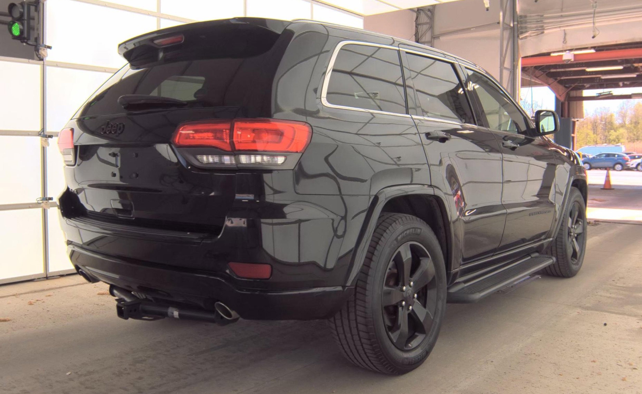Used 2014 Jeep Grand Cherokee Altitude AWD/4WD image 4