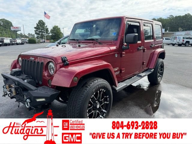 Used 2012 Jeep Wrangler Unlimited Sahara w/ Dual Top Group AWD/4WD image 1