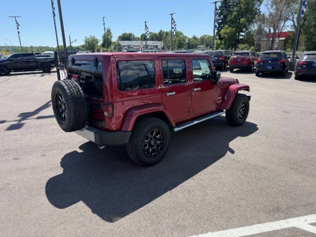 Used 2011 Jeep Wrangler Unlimited Sahara w/ Dual Top Group AWD/4WD image 10