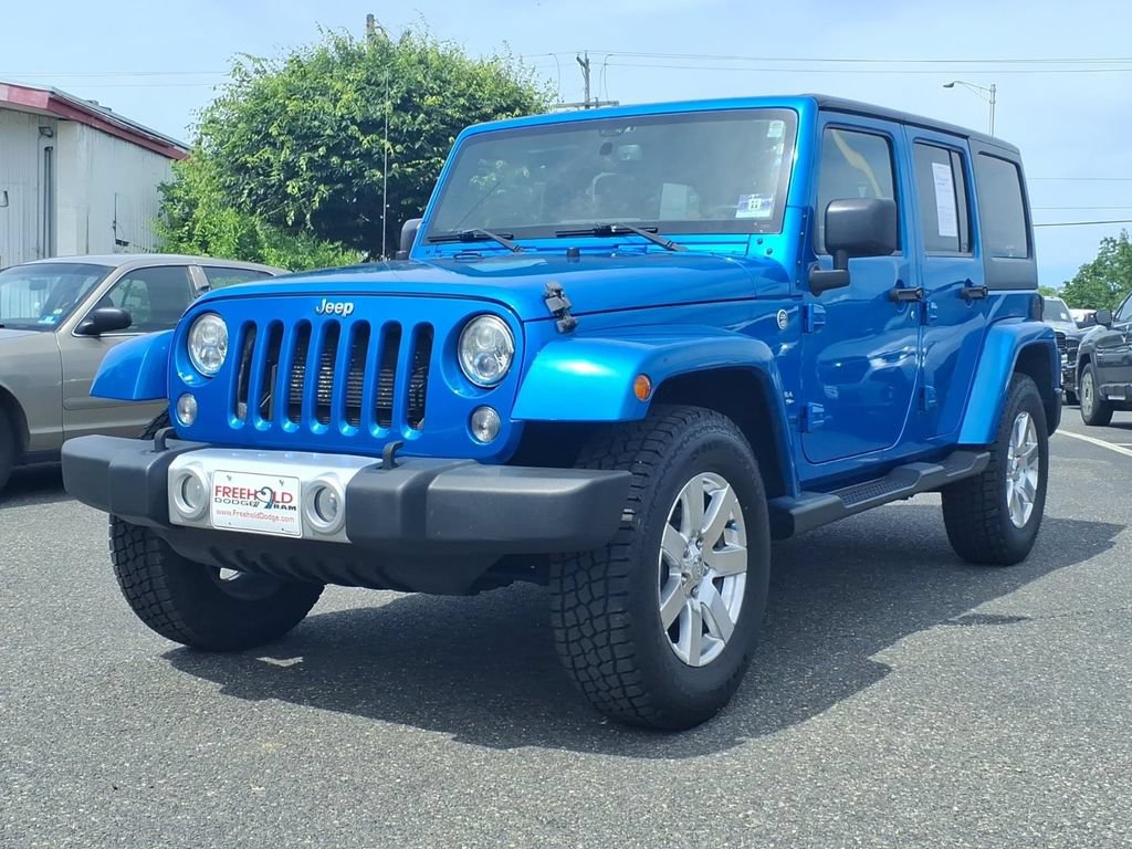 Used 2015 Jeep Wrangler Unlimited Sahara w/ Dual Top Group AWD/4WD image 2