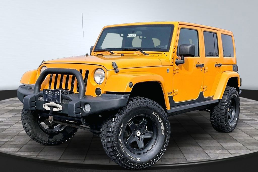 Used 2012 Jeep Wrangler Unlimited Rubicon w/ Dual Top Group image 1