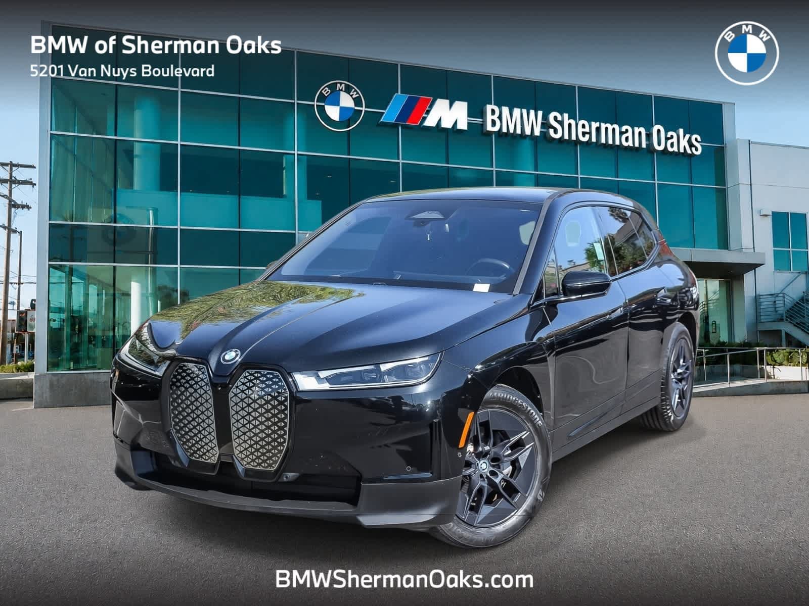 Used 2024 BMW iX xDrive50 w/ Convenience Package AWD/4WD image 1