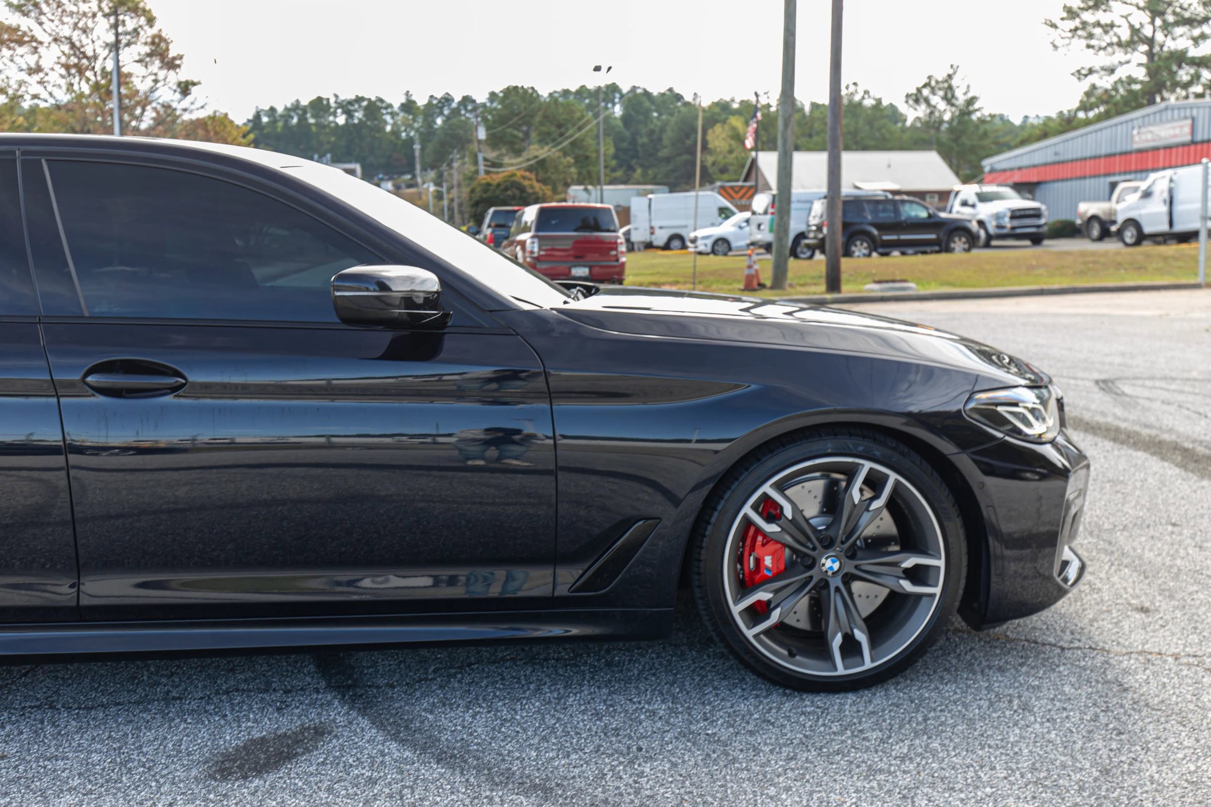 Used 2022 BMW M550i xDrive w/ Shadowloine Package image 12