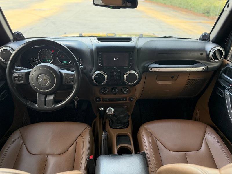 Used 2013 Jeep Wrangler Unlimited Sahara w/ Dual Top Group AWD/4WD image 28