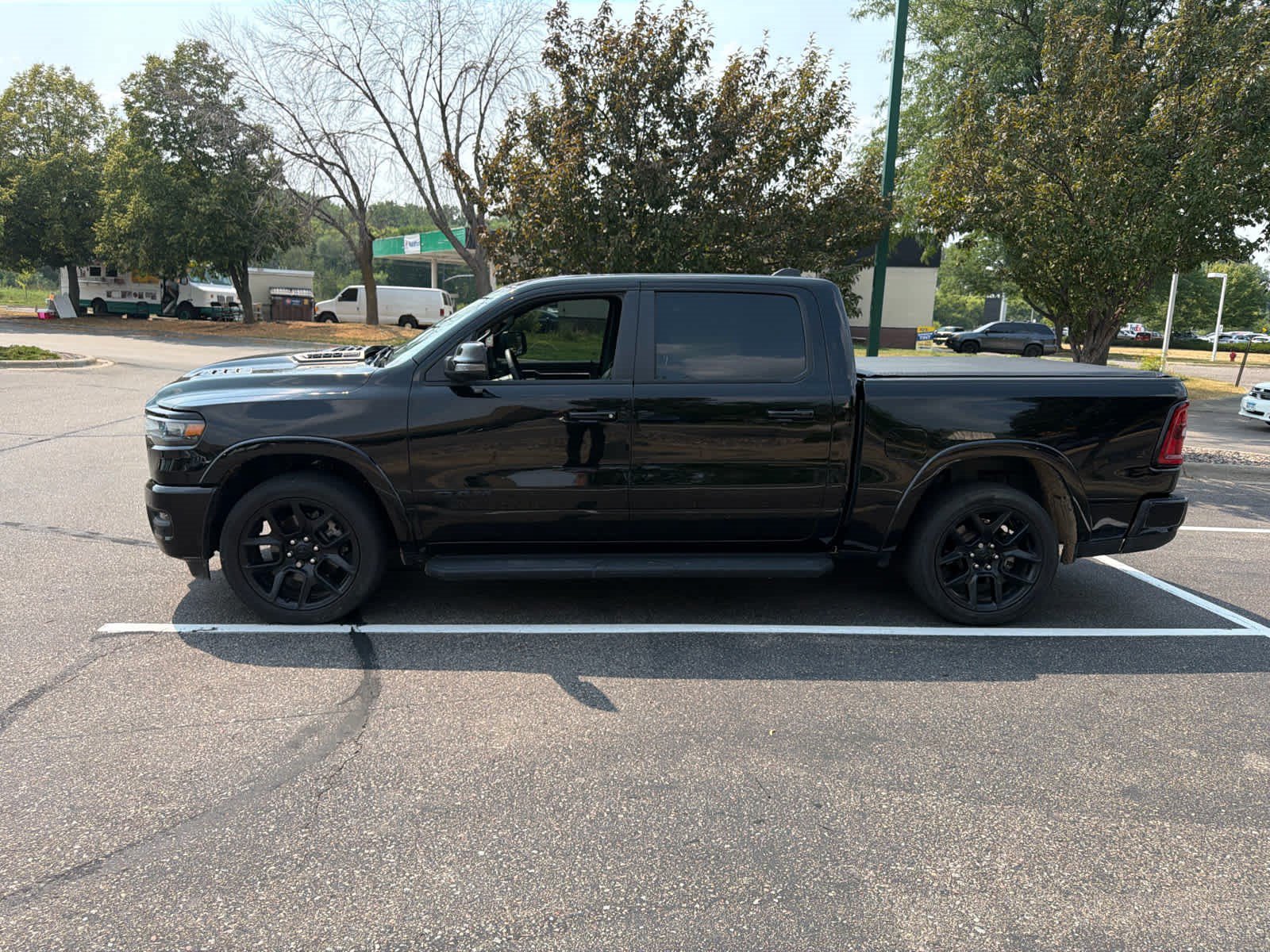 Used 2025 RAM 1500 Laramie w/ Night Edition AWD/4WD image 7