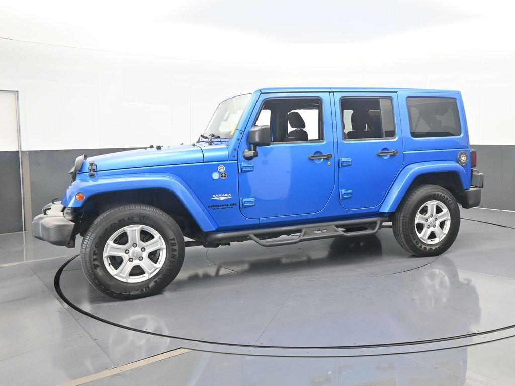 Used 2015 Jeep Wrangler Unlimited Sahara w/ Dual Top Group video 2