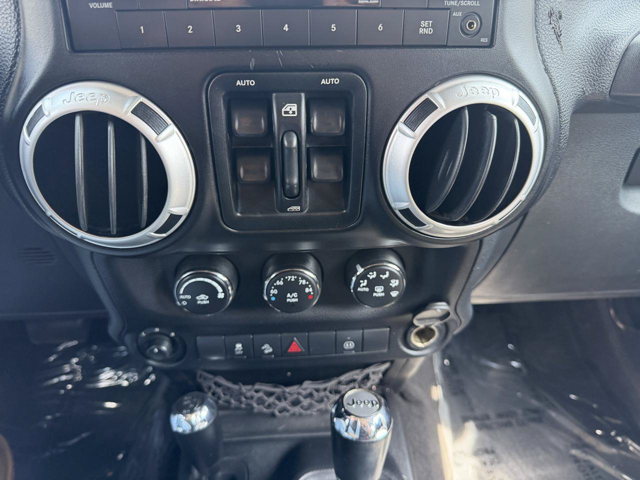Used 2012 Jeep Wrangler Unlimited Sahara w/ Dual Top Group AWD/4WD image 11