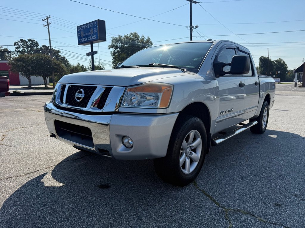 Used 2012 Nissan Titan SV w/ SV Premium Utility Pkg AWD/4WD image 1