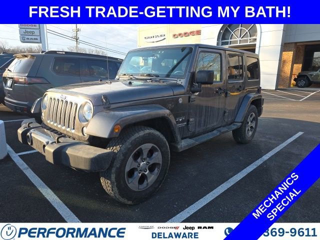 Used 2016 Jeep Wrangler Unlimited Sahara image 1