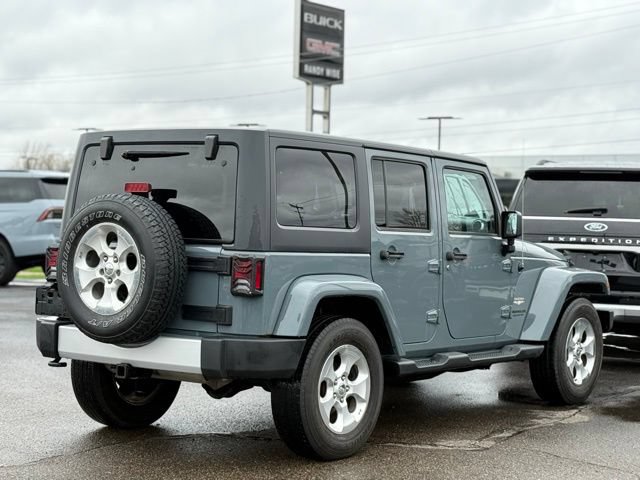 Used 2015 Jeep Wrangler Unlimited Sahara w/ Dual Top Group AWD/4WD image 35