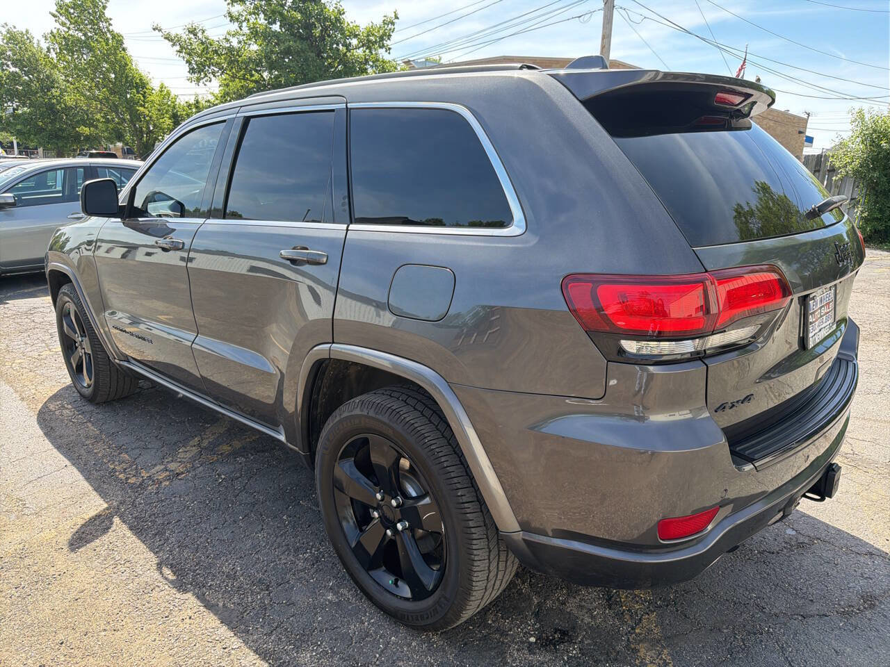 Used 2015 Jeep Grand Cherokee Altitude AWD/4WD image 4