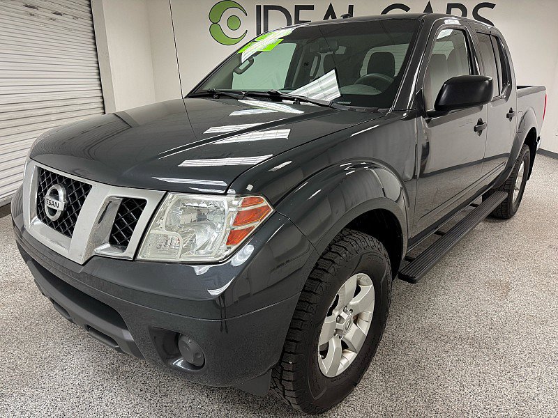 Used 2012 Nissan Frontier SV w/ SV Premium Utility Pkg AWD/4WD image 1