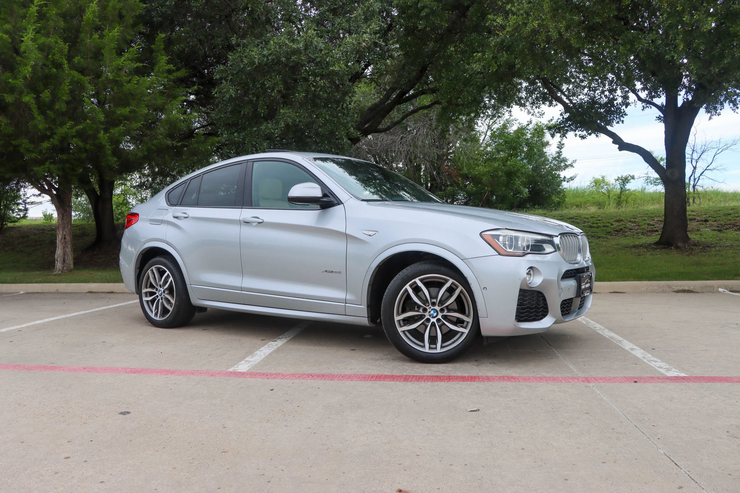 Used 2016 BMW X4 xDrive35i AWD/4WD image 1