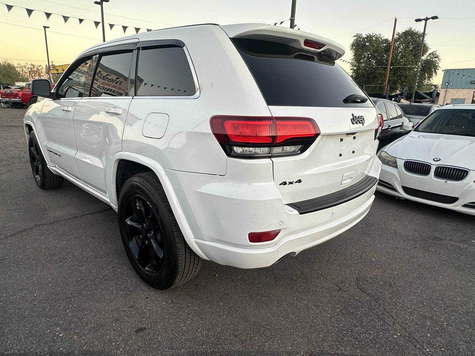 Used 2015 Jeep Grand Cherokee Altitude AWD/4WD image 4