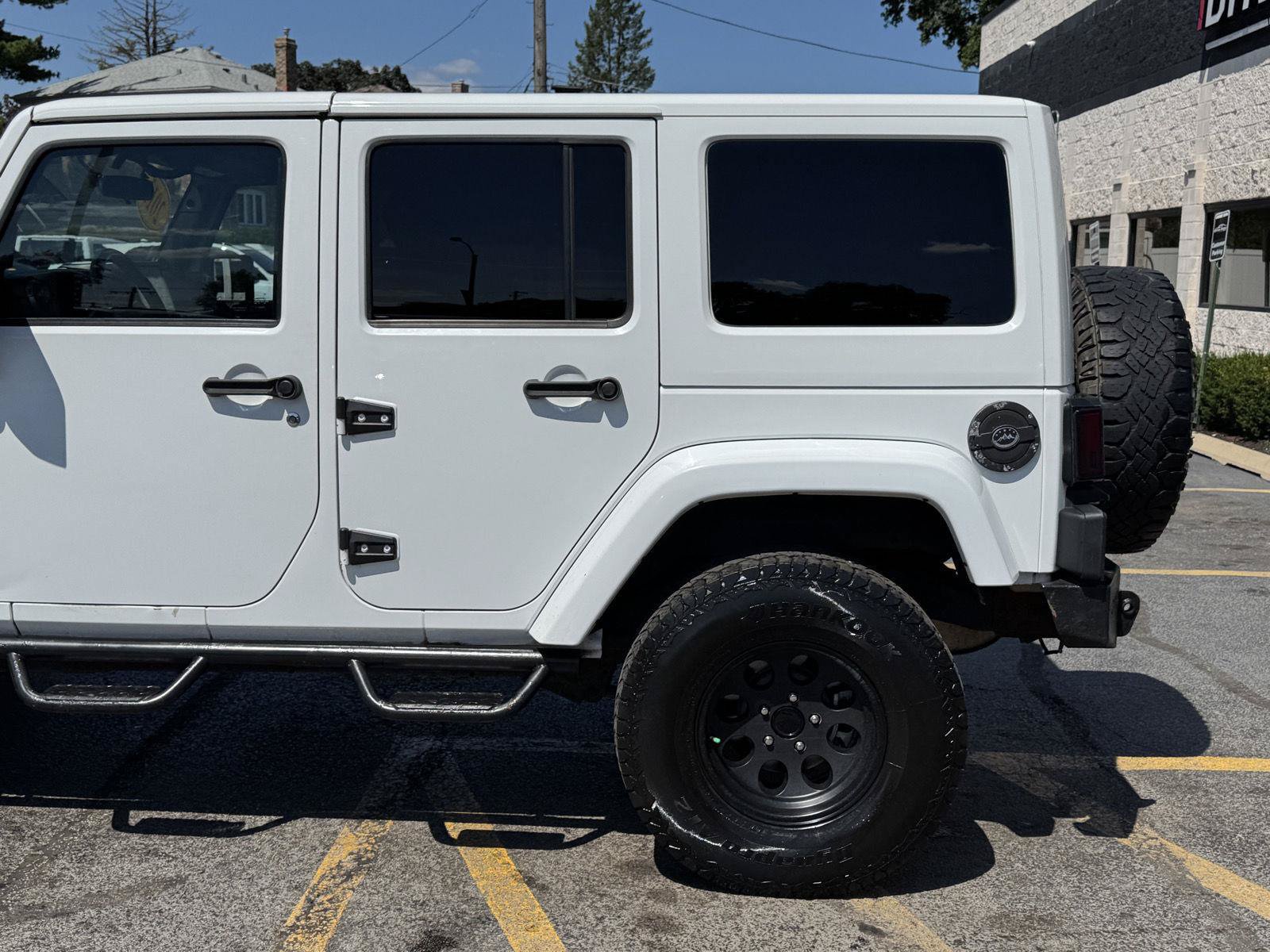 Used 2012 Jeep Wrangler Unlimited Sahara w/ Dual Top Group AWD/4WD image 3
