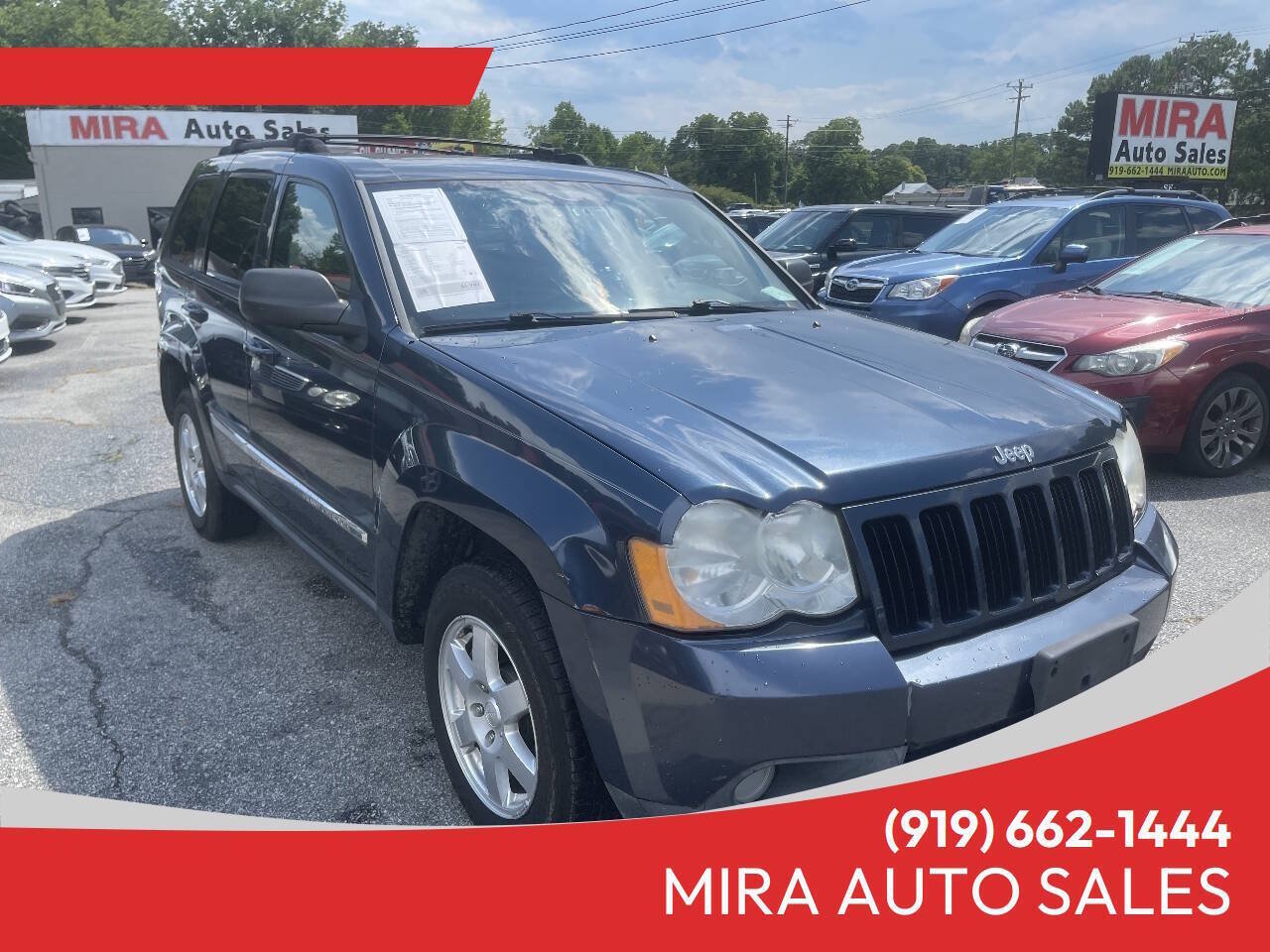 Used 2010 Jeep Grand Cherokee Laredo AWD/4WD image 1