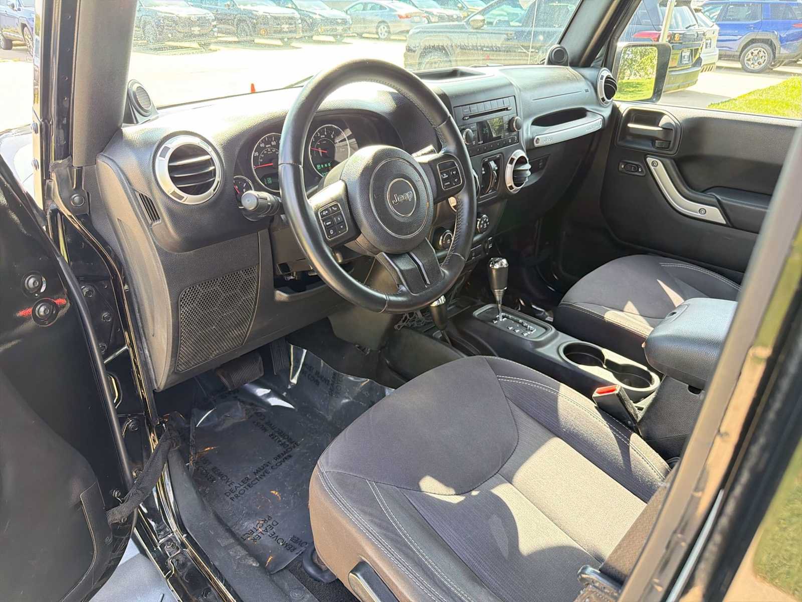 Used 2013 Jeep Wrangler Unlimited Sahara w/ Connectivity Group AWD/4WD image 2