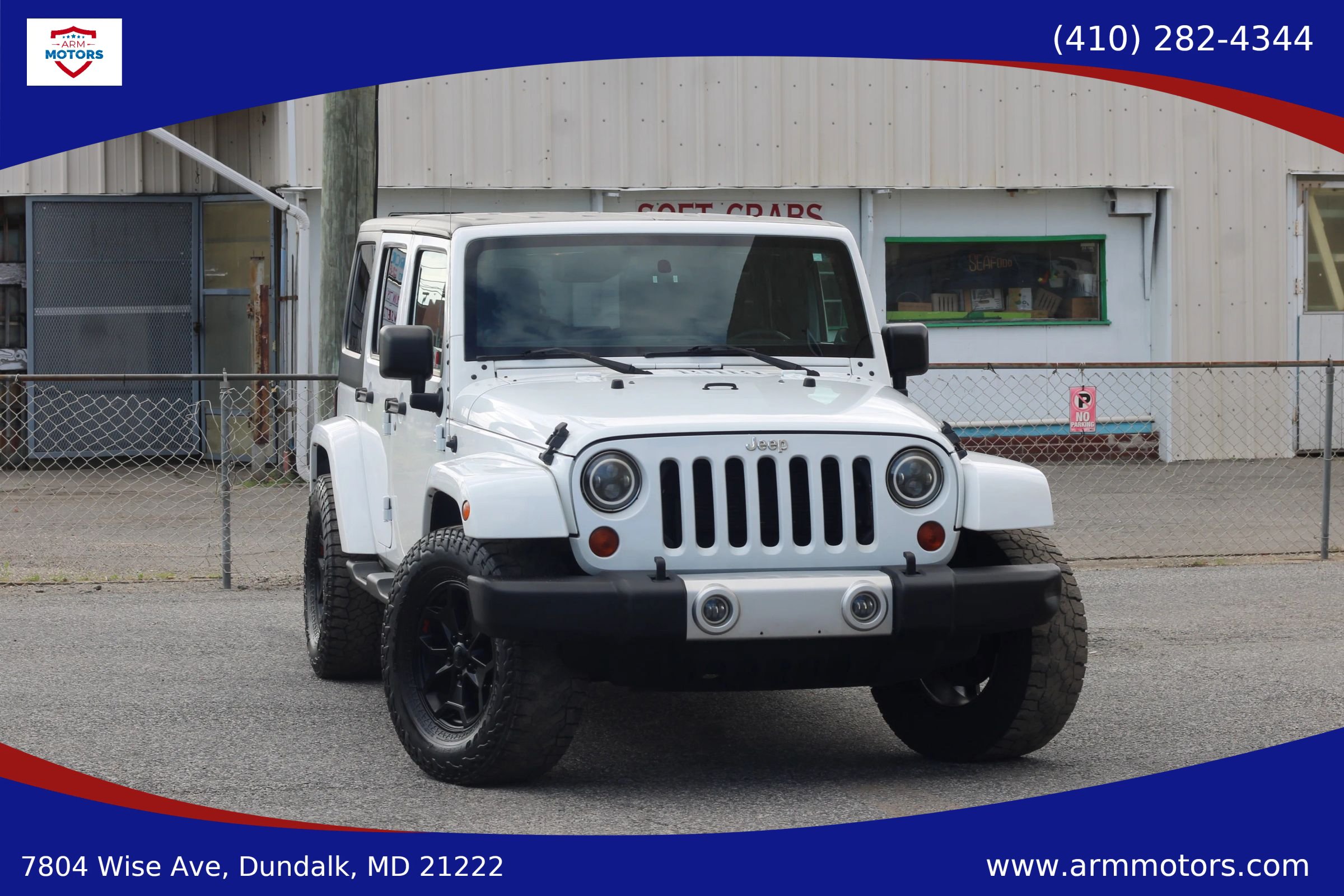 Used 2012 Jeep Wrangler Unlimited Sahara w/ Dual Top Group AWD/4WD image 1