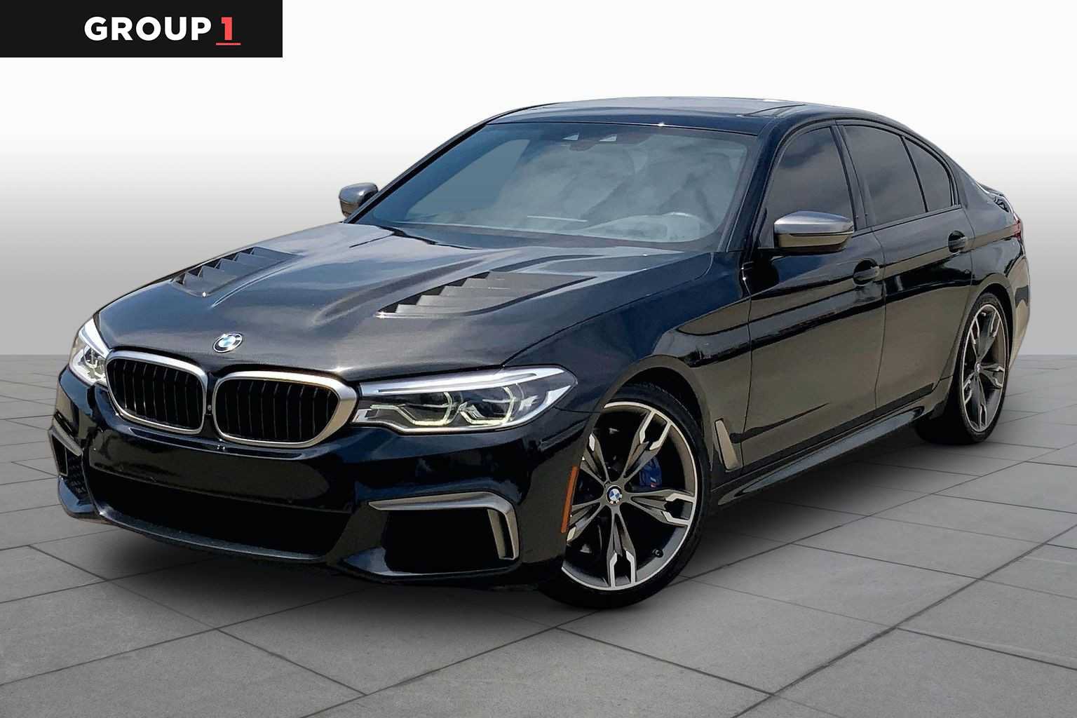 Used 2020 BMW M550i xDrive w/ Dynamic Handling Package AWD/4WD image 1