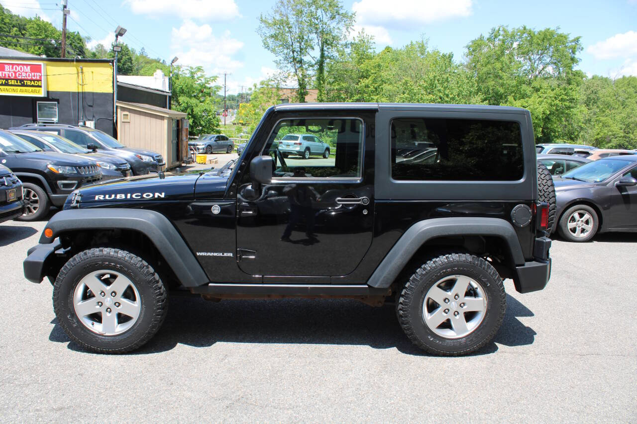 Used 2011 Jeep Wrangler Rubicon w/ Dual Top Group AWD/4WD image 11