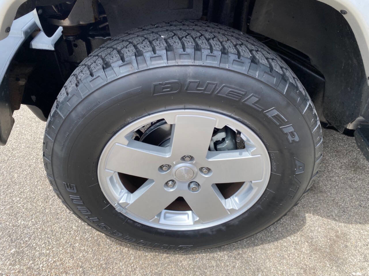 Used 2012 Jeep Wrangler Unlimited Sahara w/ Dual Top Group AWD/4WD image 9