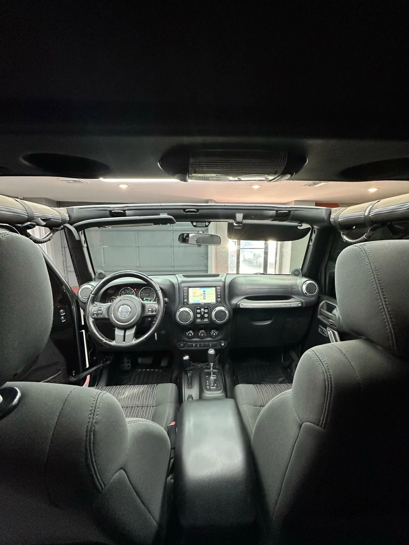 Used 2012 Jeep Wrangler Unlimited Sahara w/ Dual Top Group AWD/4WD image 21