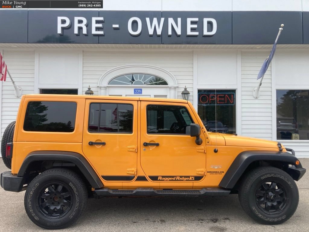 Used 2012 Jeep Wrangler Unlimited Sahara w/ Dual Top Group AWD/4WD image 4
