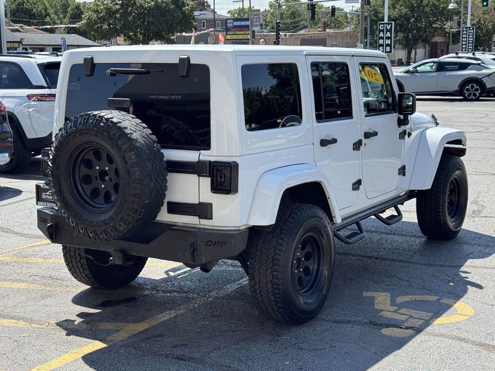 Used 2012 Jeep Wrangler Unlimited Sahara w/ Dual Top Group AWD/4WD image 10