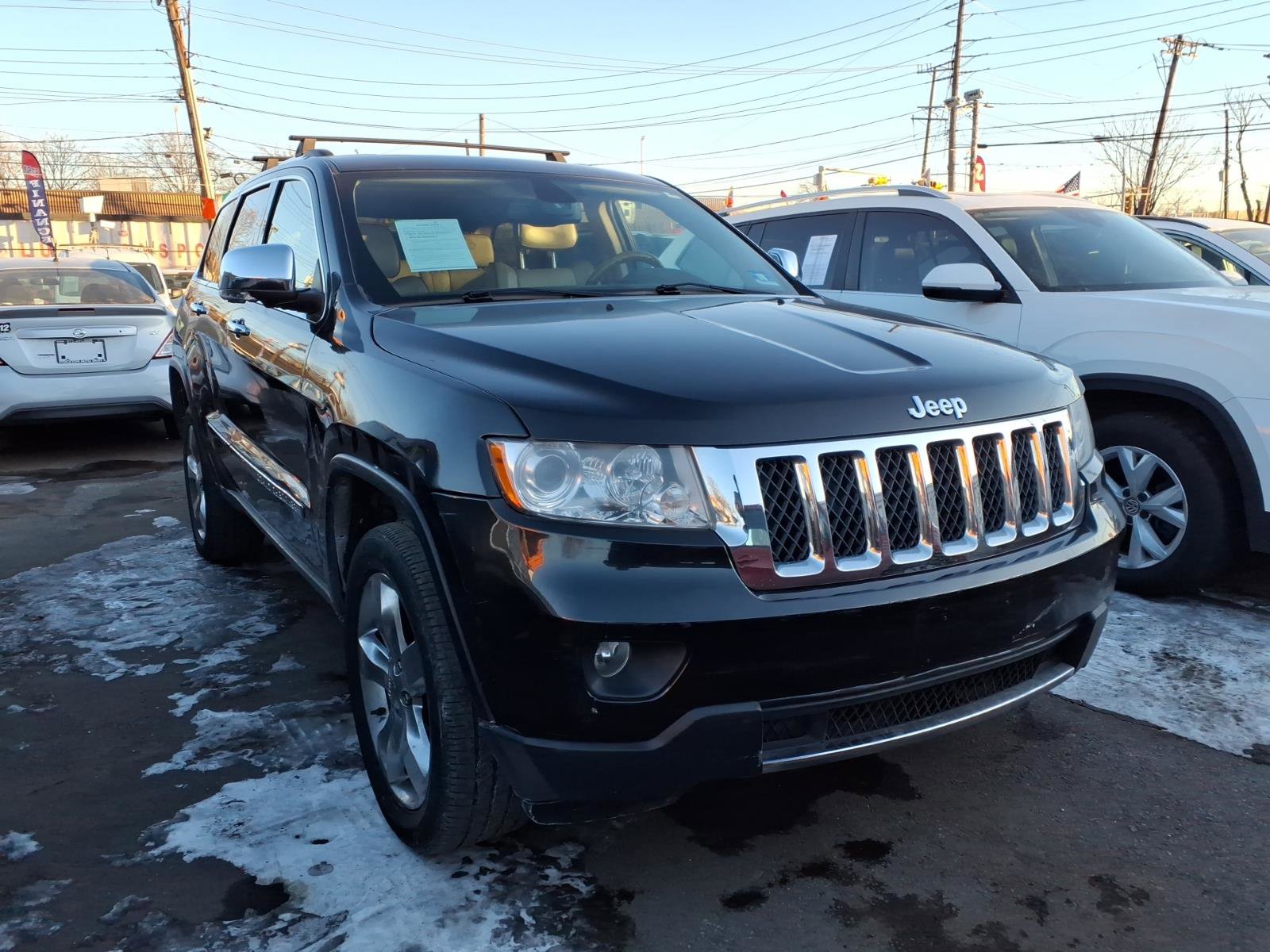 Used 2013 Jeep Grand Cherokee Overland AWD/4WD image 1