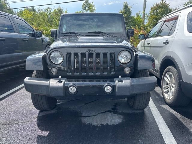 Used 2015 Jeep Wrangler Unlimited Sahara AWD/4WD video 2
