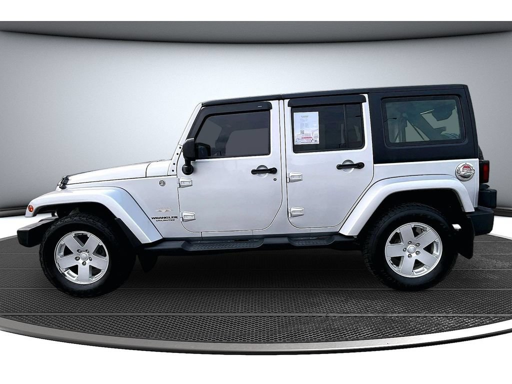 Used 2011 Jeep Wrangler Unlimited Sahara w/ Dual Top Group AWD/4WD image 17