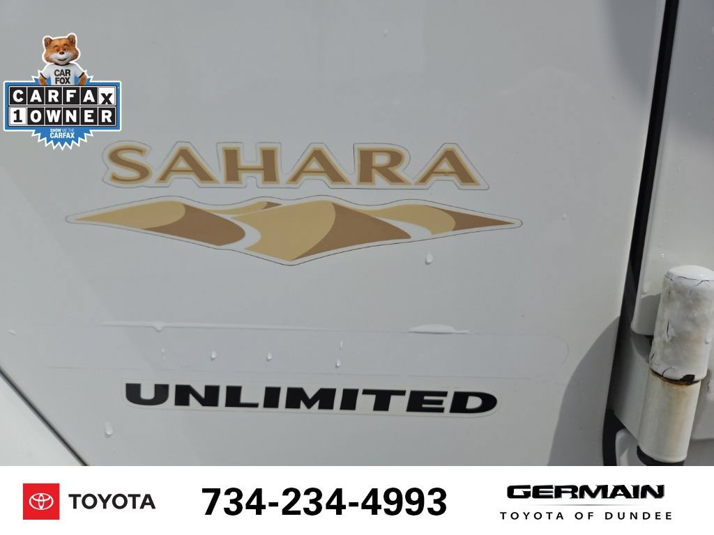 Used 2012 Jeep Wrangler Unlimited Sahara w/ Dual Top Group AWD/4WD image 12