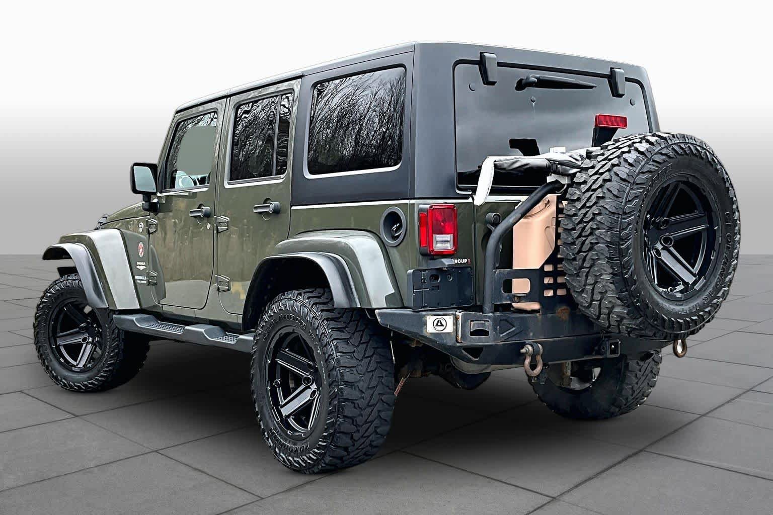 Used 2015 Jeep Wrangler Unlimited Sahara w/ Dual Top Group AWD/4WD image 12