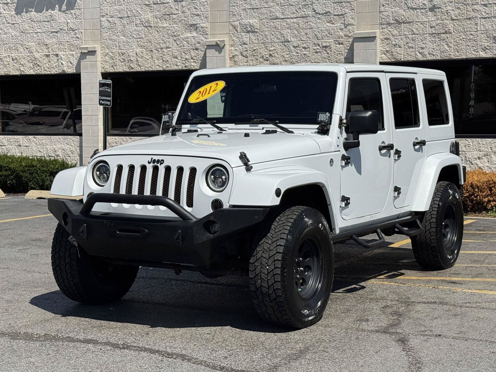 Used 2012 Jeep Wrangler Unlimited Sahara w/ Dual Top Group AWD/4WD image 16