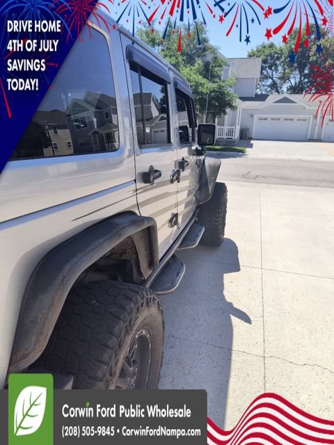 Used 2014 Jeep Wrangler Unlimited Rubicon w/ Dual Top Group AWD/4WD image 5