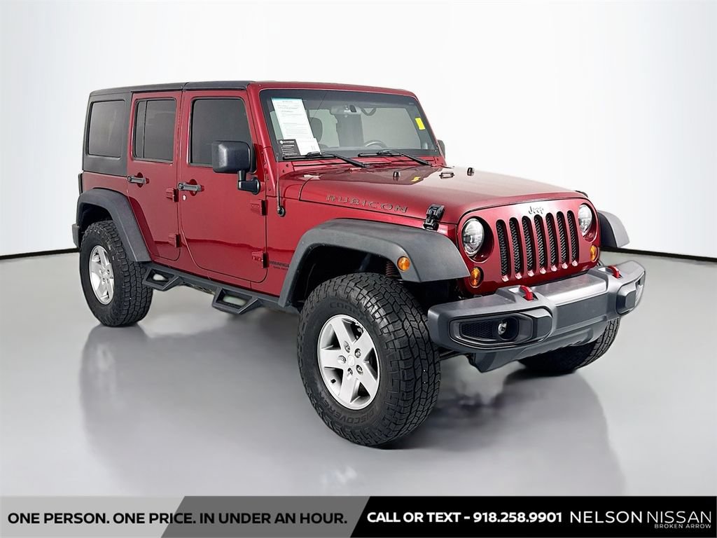 Used 2012 Jeep Wrangler Unlimited Rubicon w/ Dual Top Group AWD/4WD image 3