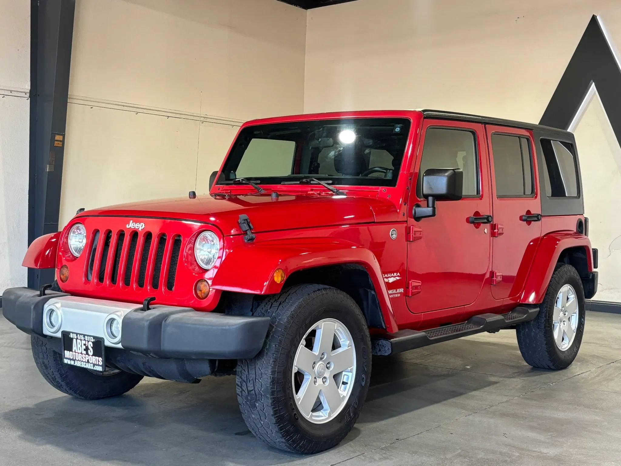 Used 2011 Jeep Wrangler Unlimited Sahara w/ Dual Top Group AWD/4WD image 1