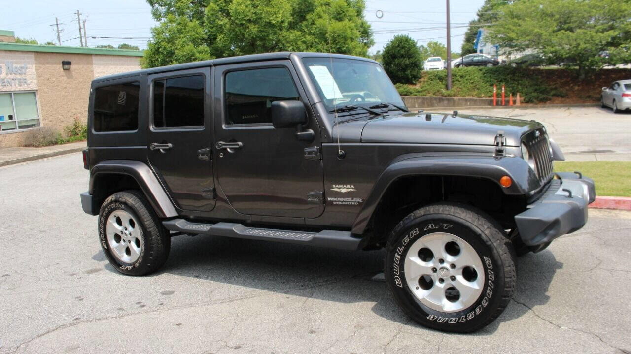 Used 2014 Jeep Wrangler Unlimited Sahara w/ Connectivity Group image 1