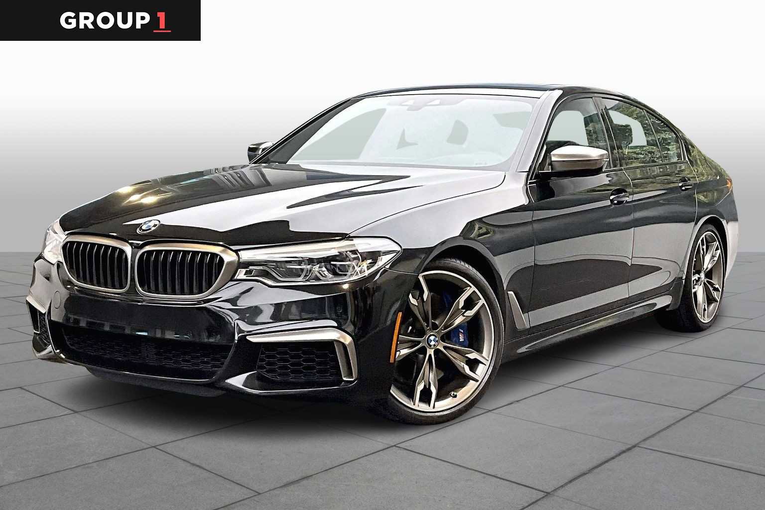 Used 2020 BMW M550i xDrive w/ Executive Package image 1