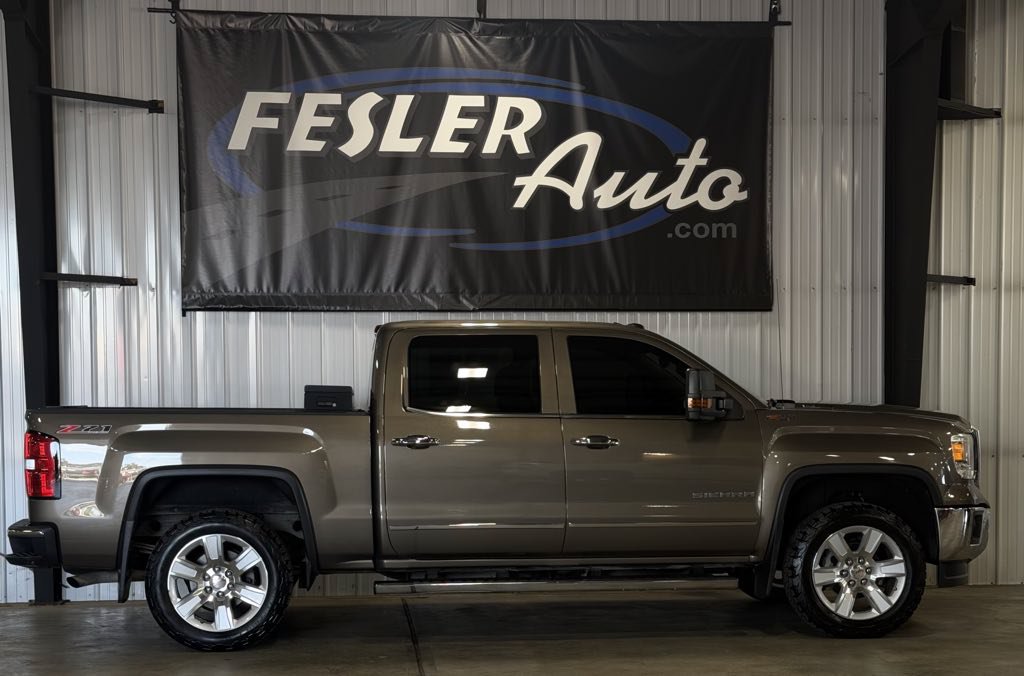Used 2015 GMC Sierra 1500 SLT w/ Driver Alert Package AWD/4WD image 1
