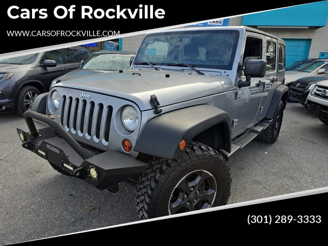 Used 2013 Jeep Wrangler Unlimited Sport image 1