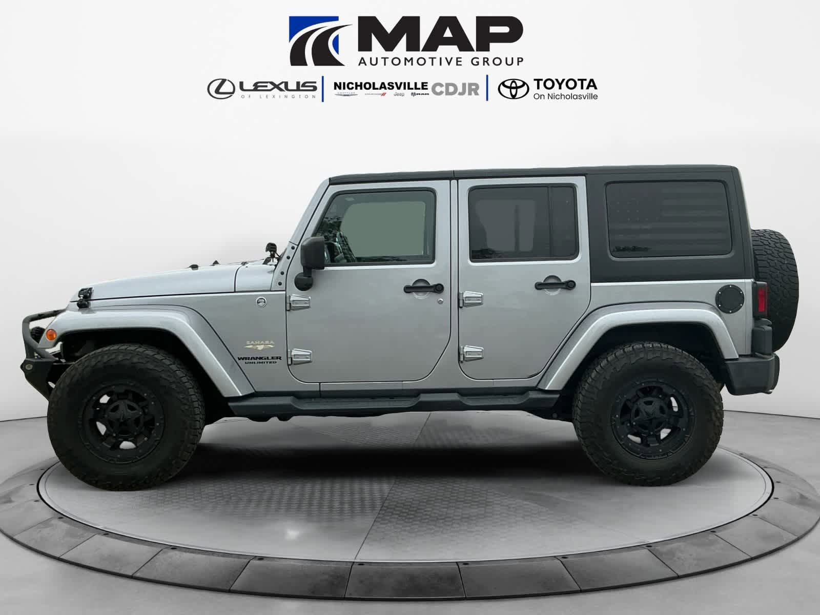 Used 2015 Jeep Wrangler Unlimited Sahara w/ Dual Top Group AWD/4WD image 2