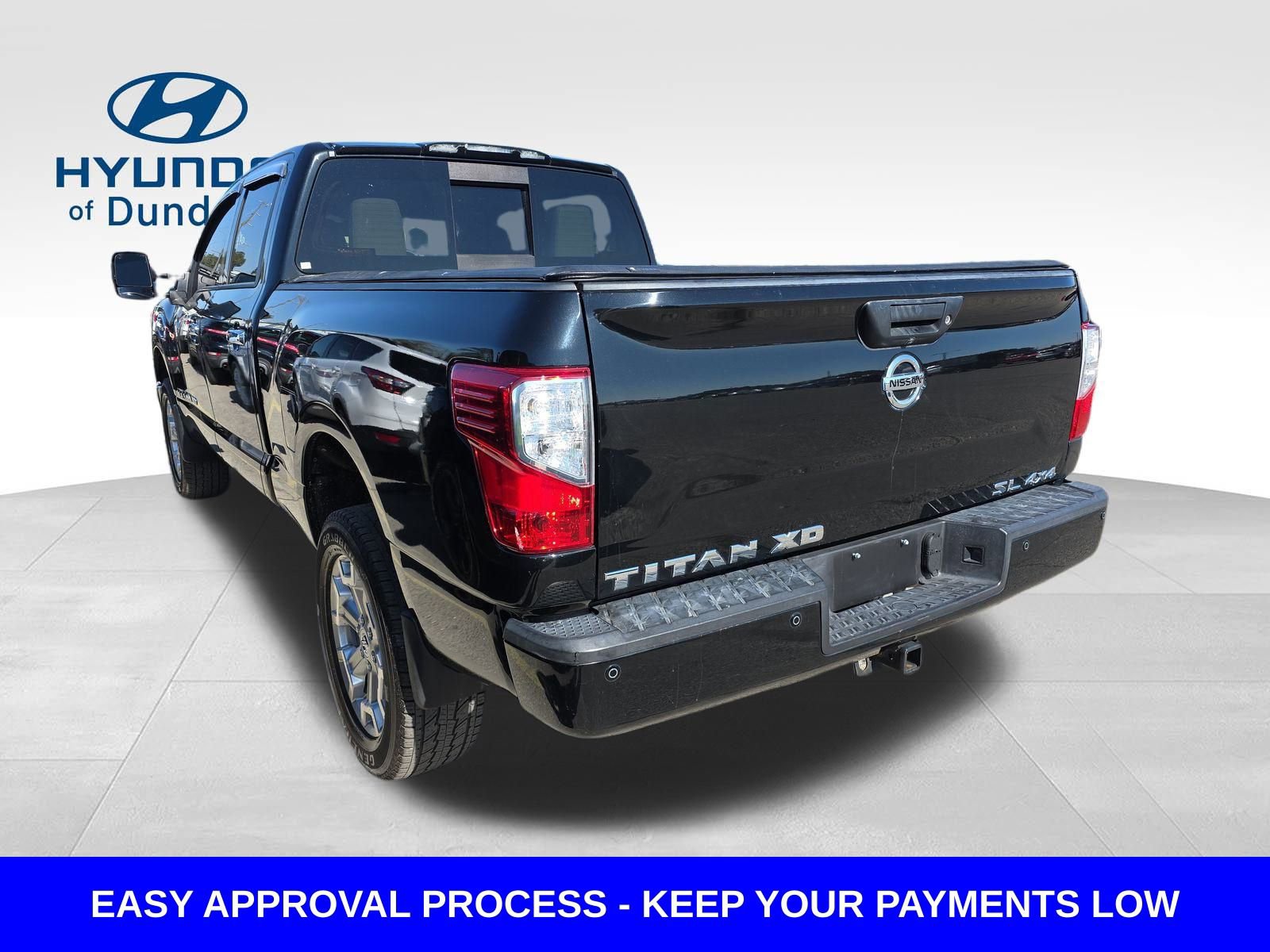Used 2016 Nissan Titan SL image 1