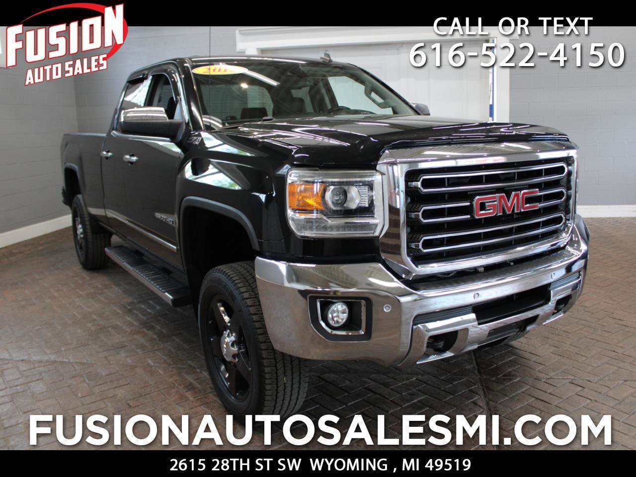 Used 2015 GMC Sierra 2500 SLT w/ Driver Alert Package AWD/4WD image 1