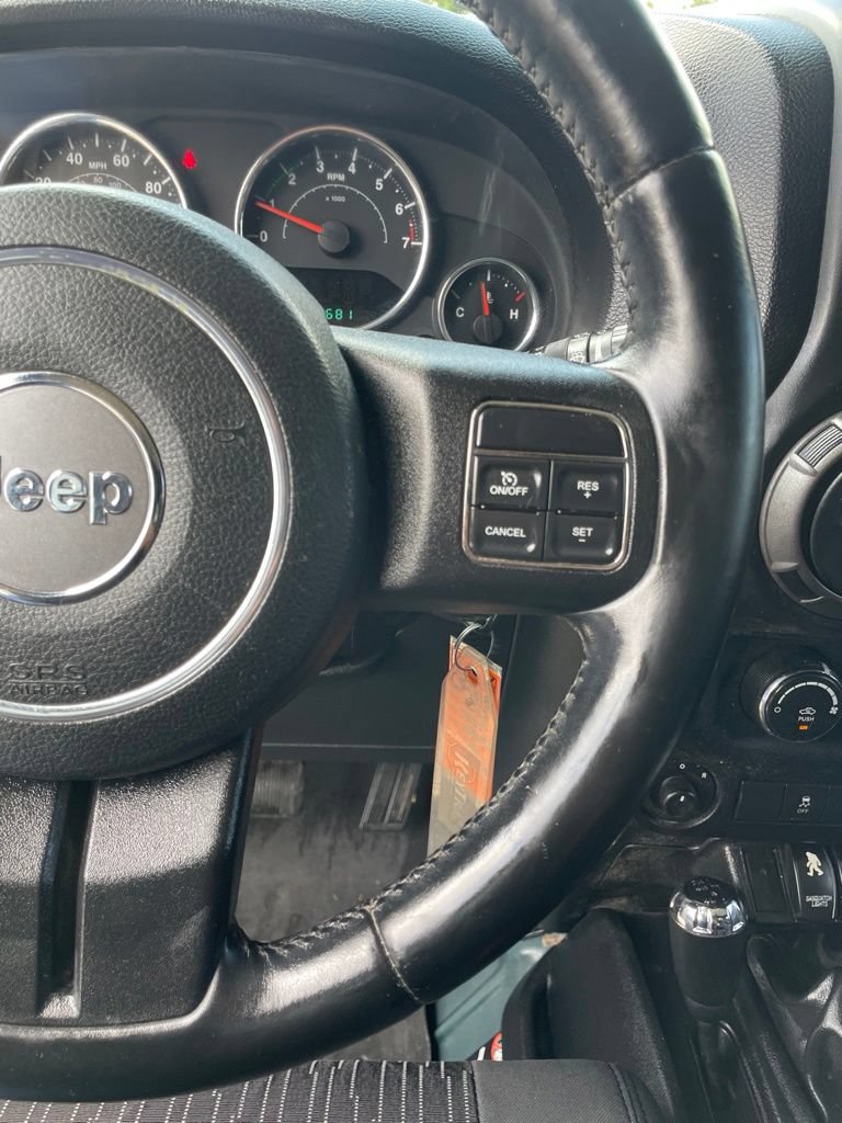 Used 2012 Jeep Wrangler Unlimited Sport AWD/4WD image 14